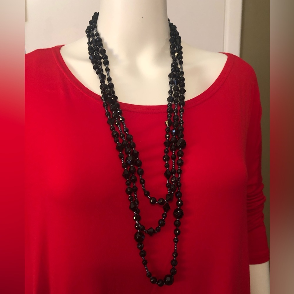 Black three strand beaded necklace
